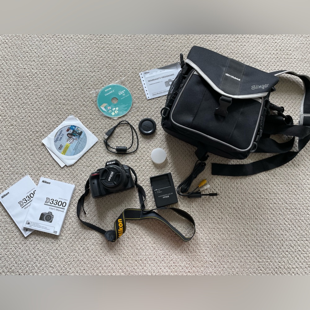Nikon D3300 DSLR with bag and accessories